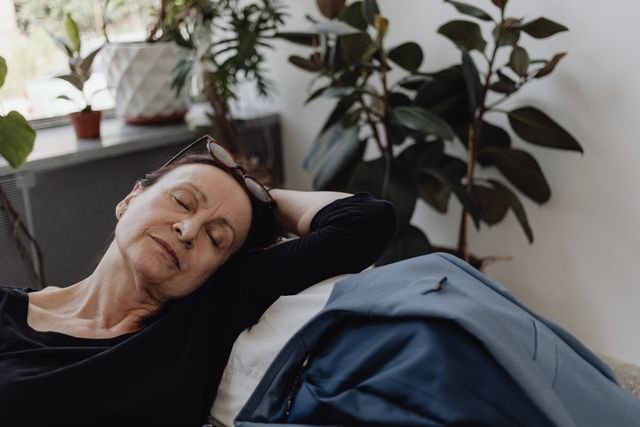Woman resting on couch